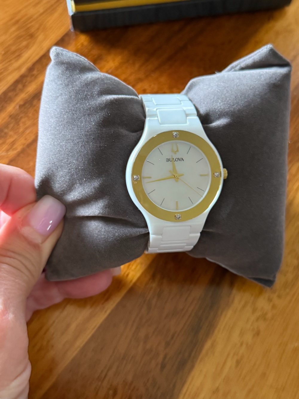 Bulova White Ceramic Watch with Gold Bezel and Crystal Accents